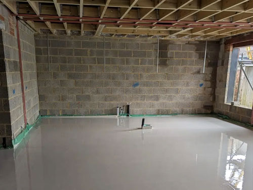 freshly screed floor in archway